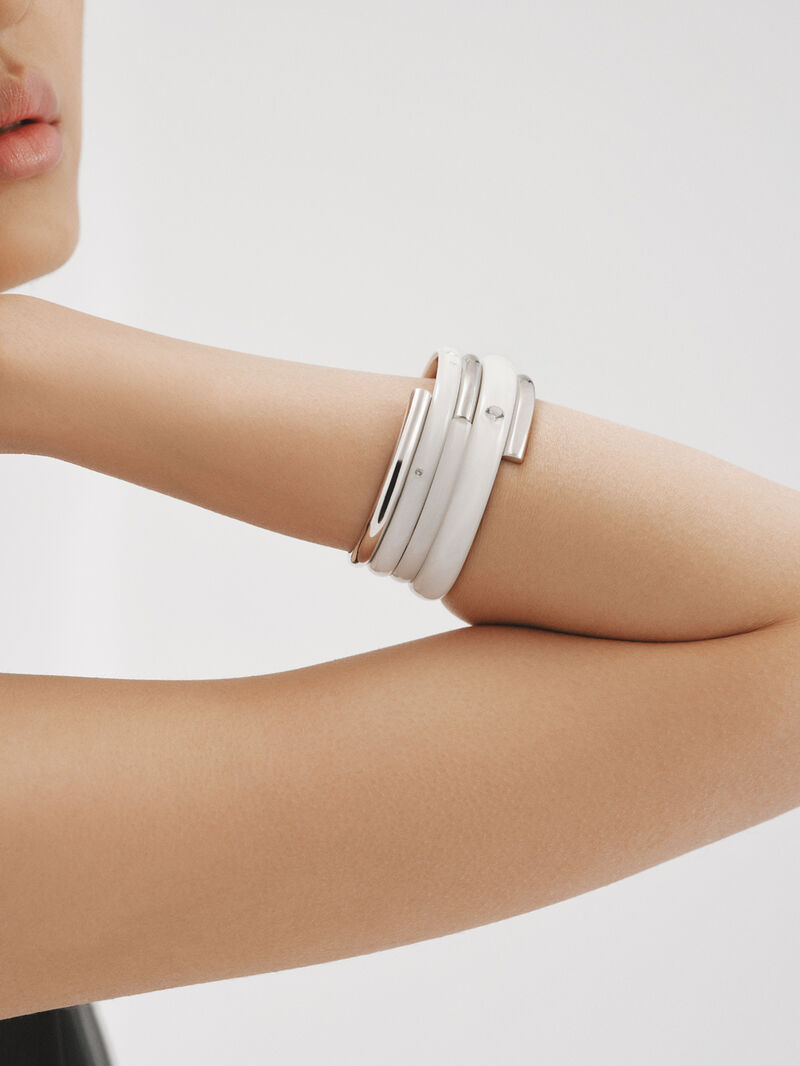 925 silver bracelet with white enamel and zircons suspended in resin image number 1