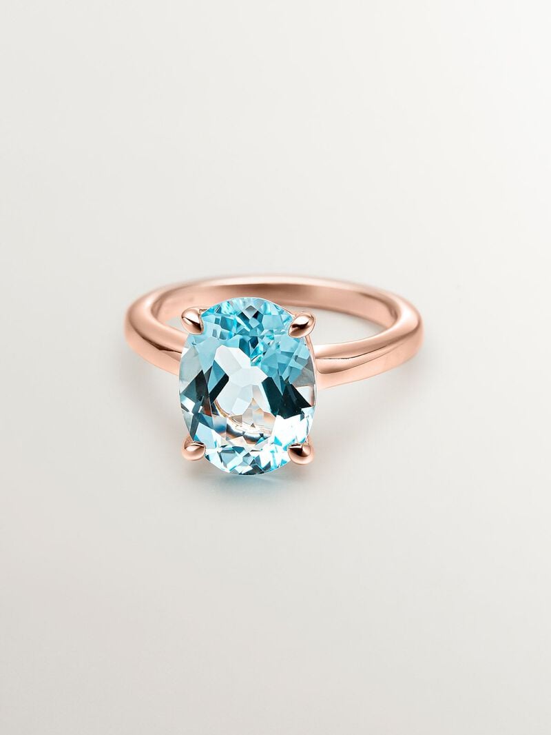 931 Silver ring coated in 18K rose gold with sky blue topaz image number 2