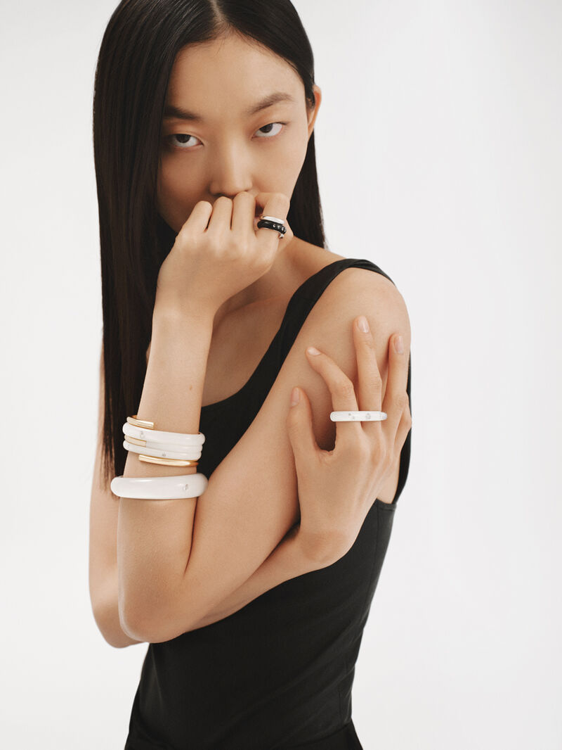 Rigid 925 silver bracelet with white enamel and zircons suspended in resin image number 6