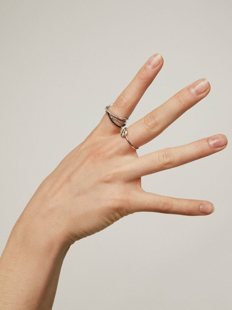 Triple crossed ring made of 925 silver plated in 18K yellow gold with white topazes and black spinels. image number 5