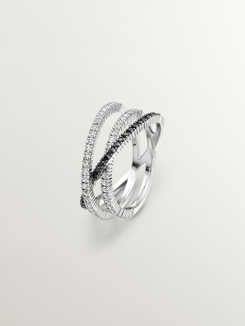 Triple crossed ring made of 925 silver plated in 18K yellow gold with white topazes and black spinels. image number 0