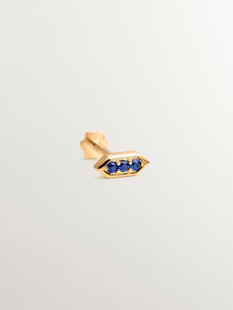 Hexagonal piercing of 18k yellow gold with blue sapphires image number 2