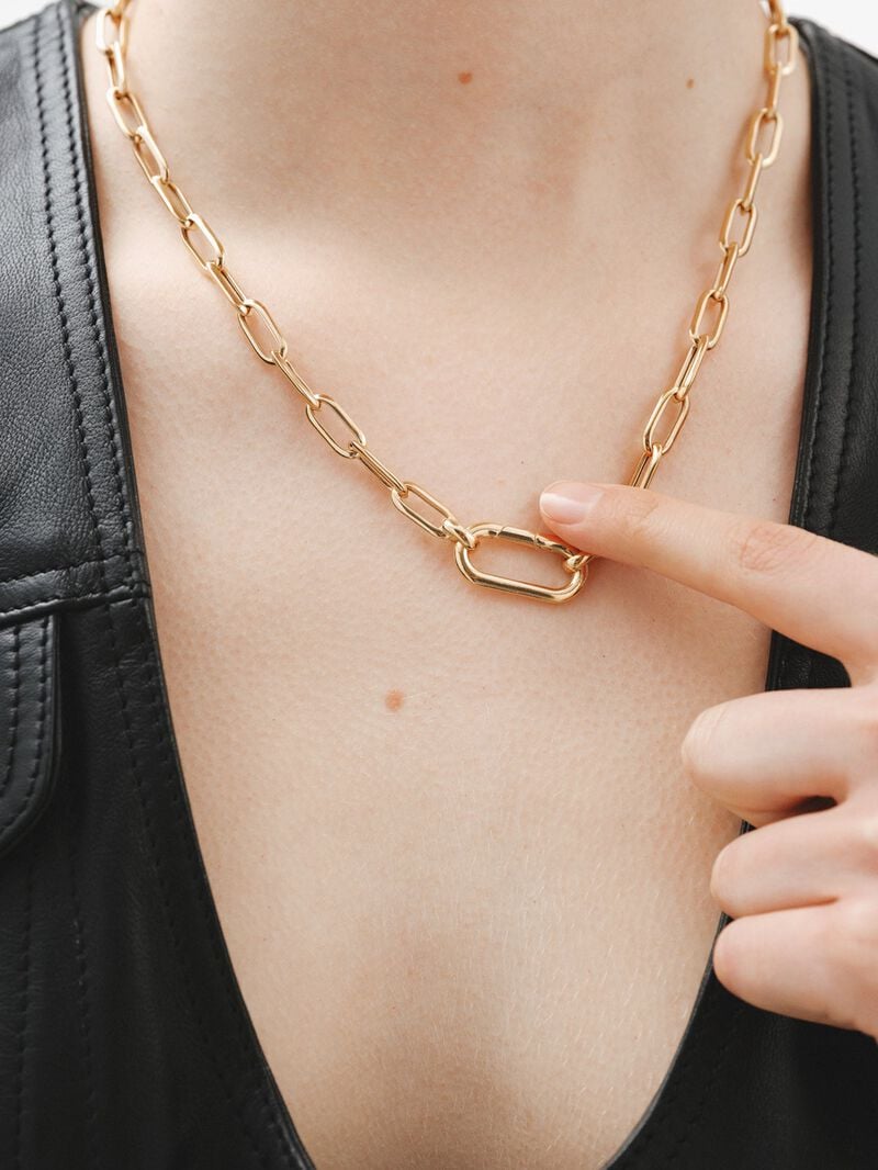 Oval carabiner in 925 silver coated in 18K yellow gold. image number 1