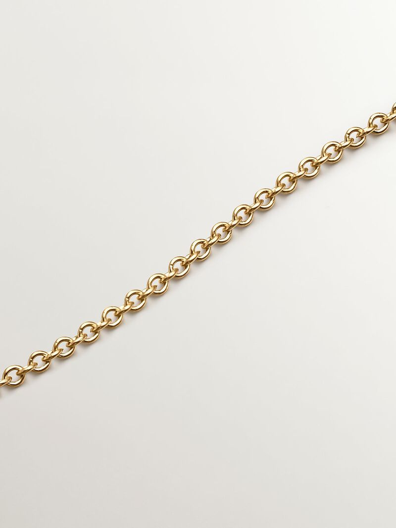925 Silver pendant bathed in 18K yellow gold with sky blue topaz and white sapphires. image number 4