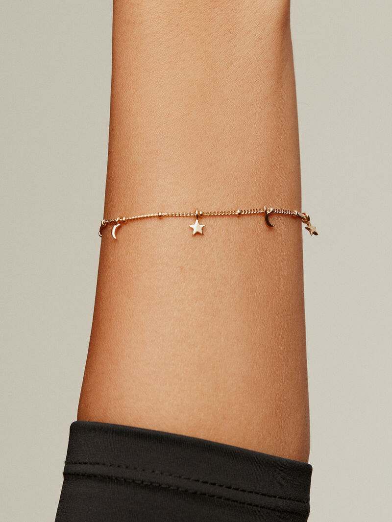 925 Silver bracelet bathed in 18K yellow gold with moons and stars. image number 1