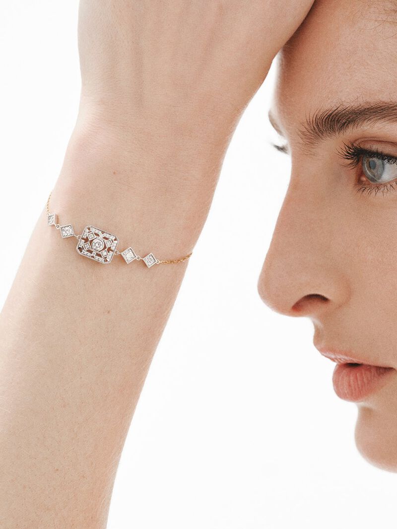 18K white and yellow gold bracelet with brilliant cut diamonds image number 1