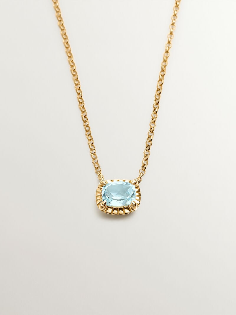925 Silver pendant bathed in 18K yellow gold with sky blue topaz. image number 0