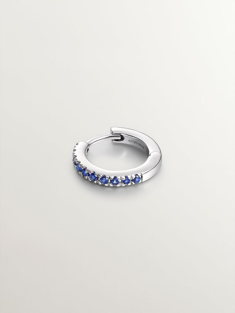 Individual small hoop earring made of 9K white gold with blue sapphires. image number 2