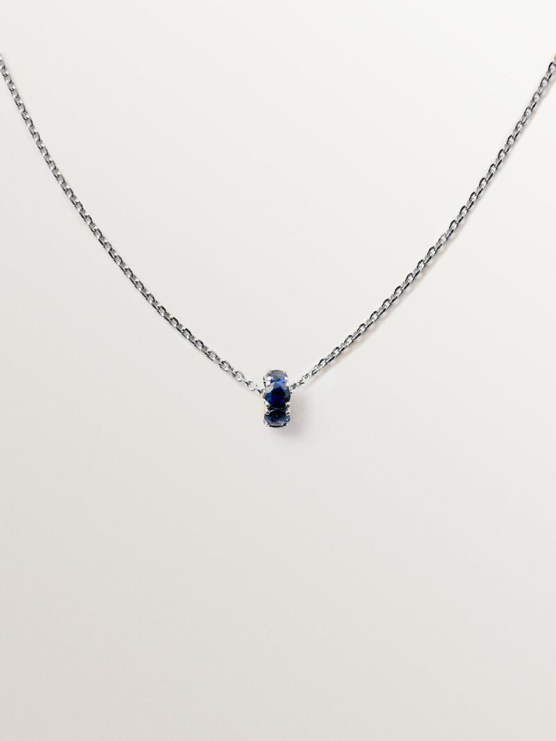9K white gold pendant with blue sapphires and diamonds image number 0