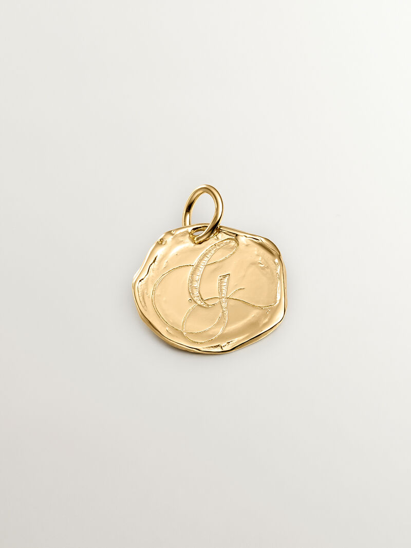 Handcrafted 925 silver charm dipped in 18K yellow gold with the initial G. image number 0