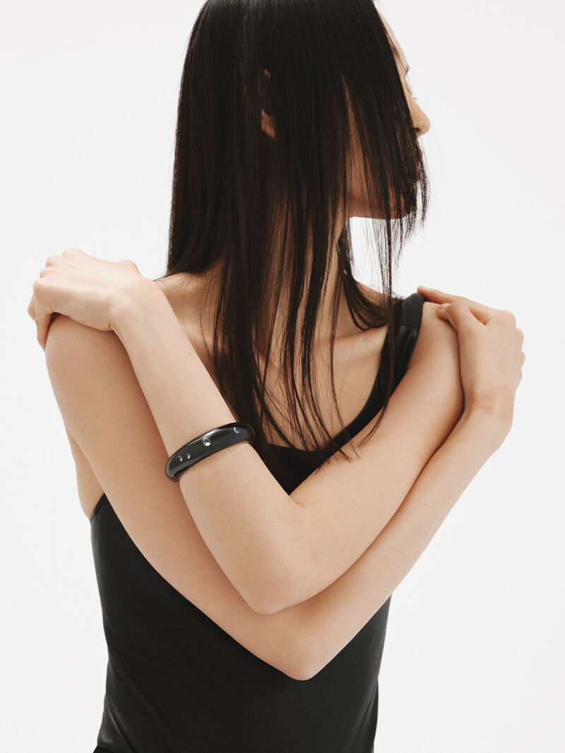 Rigid 925 silver bracelet with black enamel and zircons suspended in resin image number 5