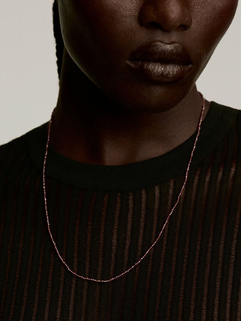 925 Silver necklace bathed in 18K yellow gold with pink rhodolite beads. image number 1