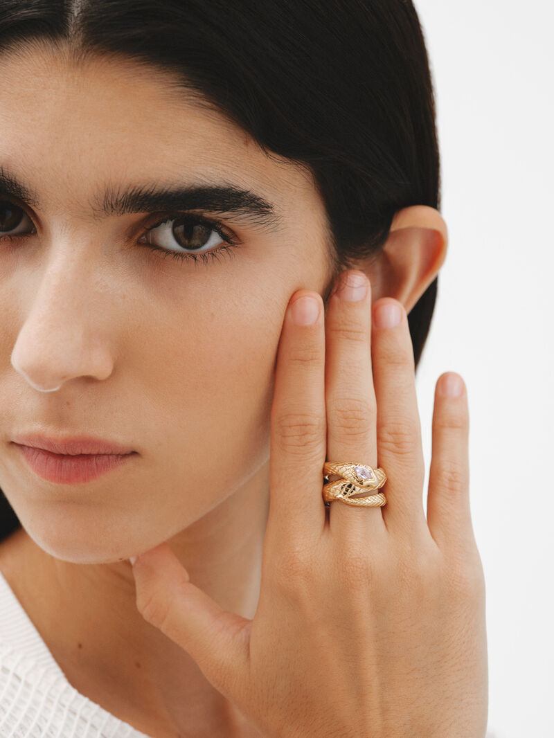 Wide 925 silver ring bathed in 18K yellow gold with a snake shape, purple amethyst and green tsavorites. image number 1