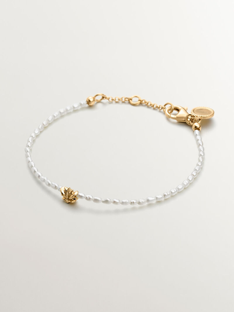 River pearl bracelet with 925 silver lotus flower coated in 18K yellow gold. image number 0