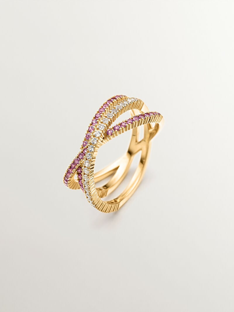 925 Silver triple crossover ring bathed in 18K yellow gold with white topaz and purple rhodolite. image number 0