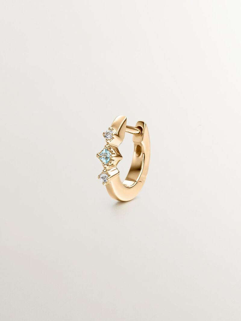 Individual 925 silver hoop earring bathed in 18K yellow gold with blue and white topazes. image number 4
