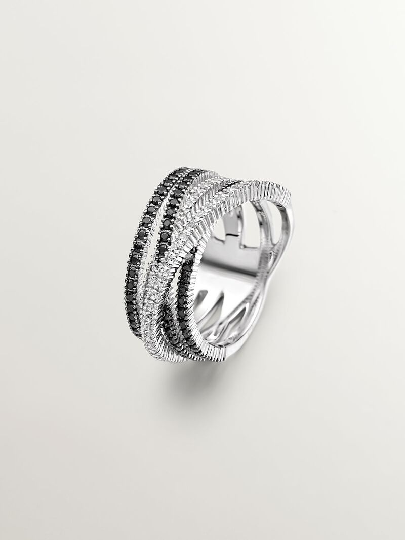 Crossed multi-arm 925 silver ring with white topazes and black spinels. image number 0