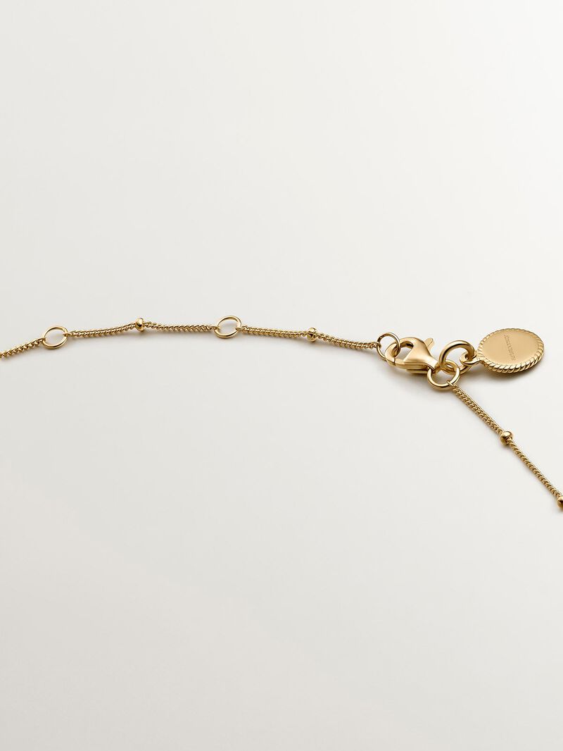 925 Silver pendant bathed in 18K yellow gold with a moon and white topazes. image number 6