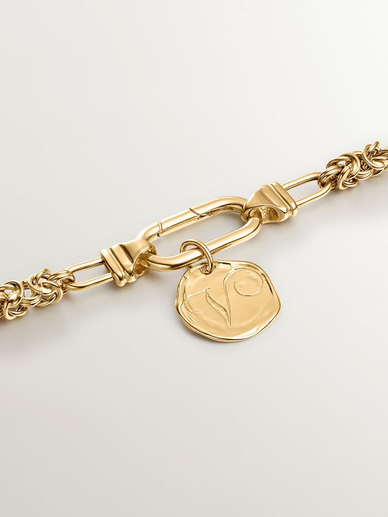 Handcrafted charm made from 925 silver, coated in 18K yellow gold with the initial 'V' image number 1
