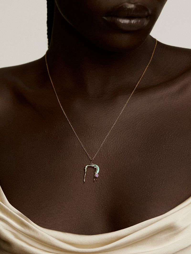 925 Silver charm bathed in 18K yellow gold in the shape of the Nut goddess, purple amethyst and enamel. image number 1