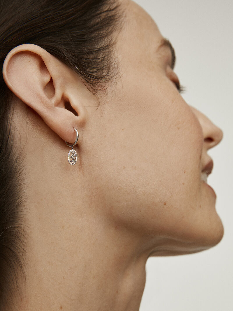 Individual 18K white gold earring with diamonds. image number 3