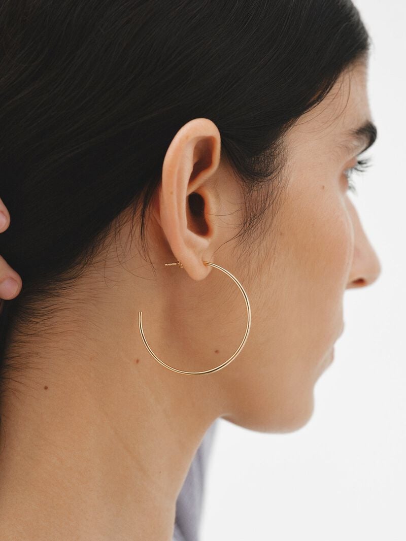 Large hoop earrings made of 925 silver coated in 18K yellow gold. image number 1