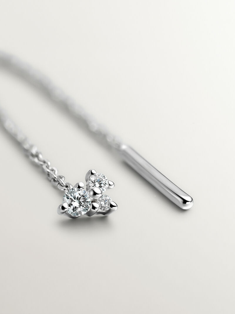 Single 9K white gold earring with chain and diamonds. image number 2