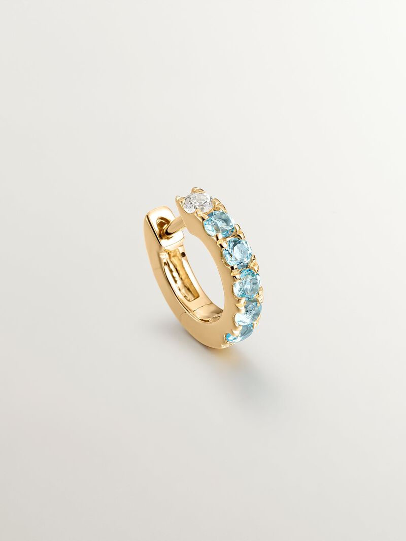 Individual 925 silver earring bathed in 18K yellow gold with white and blue sapphires. image number 4