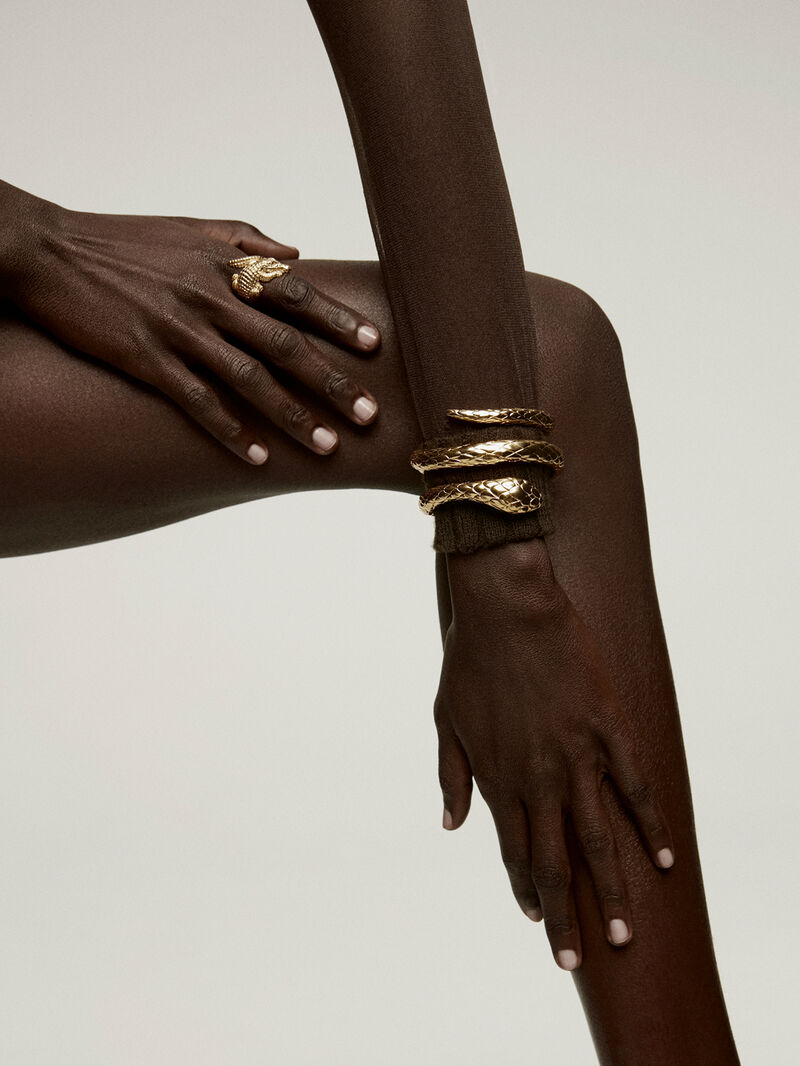Rigid bracelet made of 925 silver, covered in 18K yellow gold, with a snake shape. image number 5