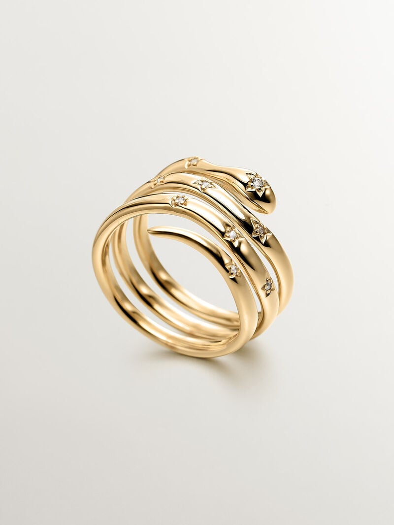 925 Silver triple ring bathed in 18K yellow gold with a snake shape and white topazes. image number 4