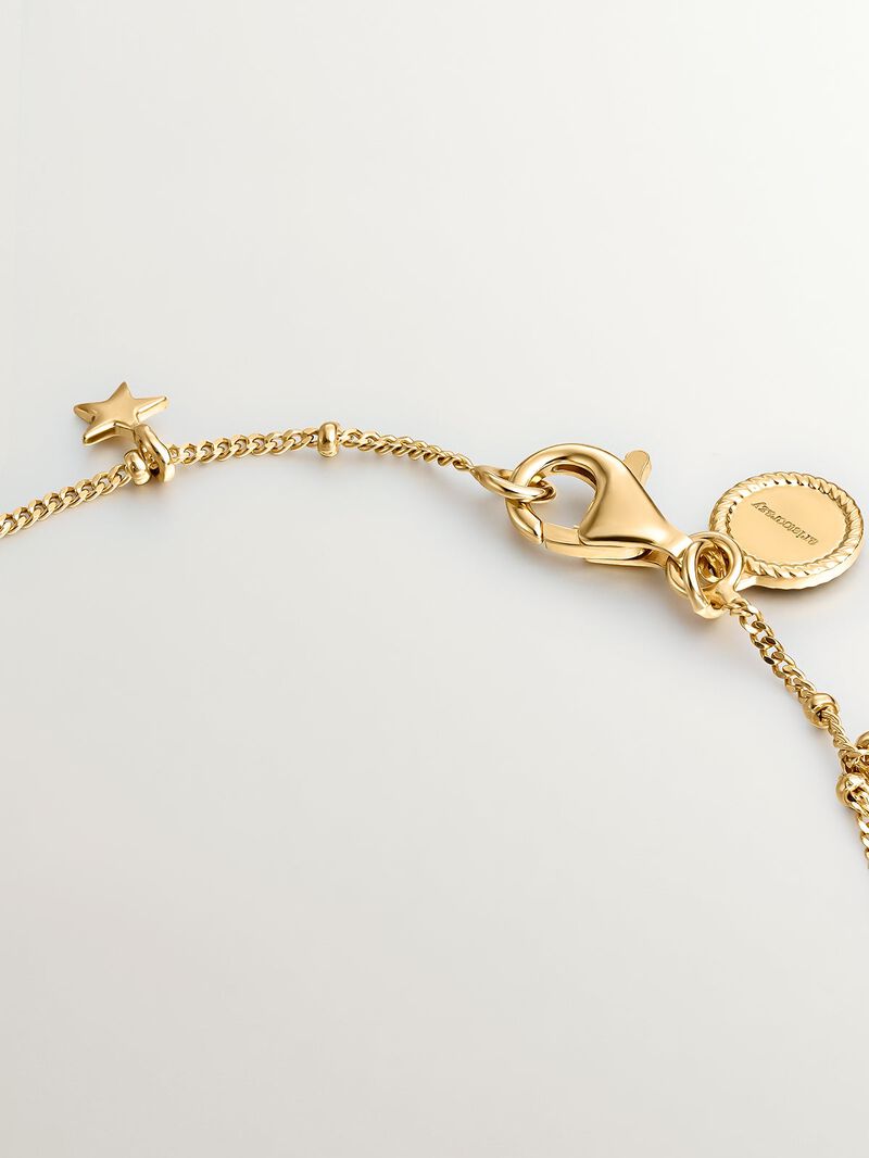 18K yellow gold plated 925 silver bracelet with mushroom, cross, eye, shell, and star motifs. image number 6
