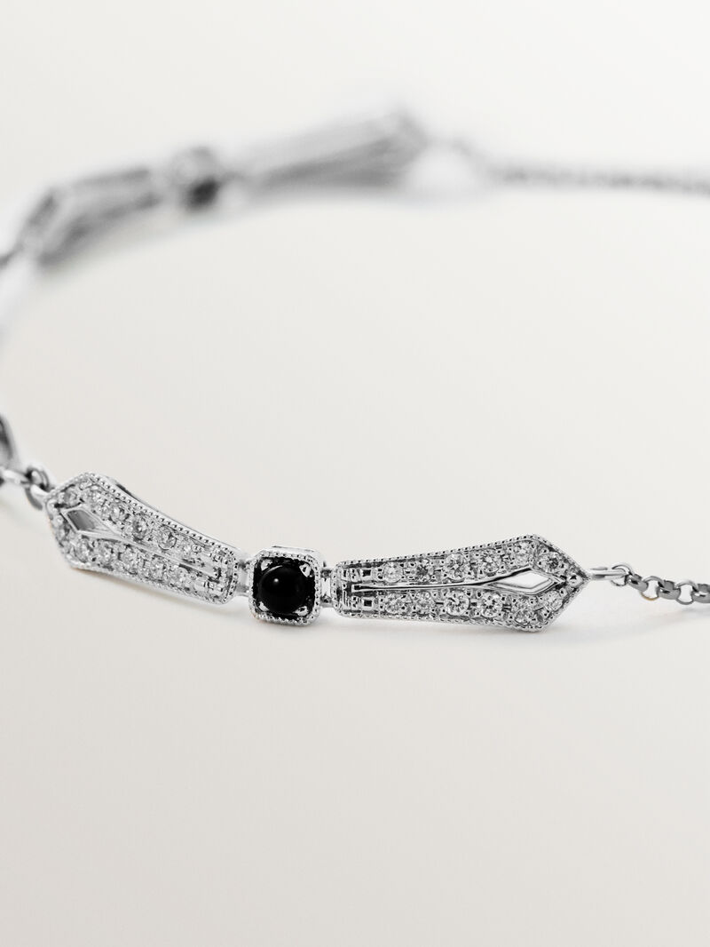 Pulsera de oro blanco de 18K con ónix negro y diamantes en talla brillante image number 2