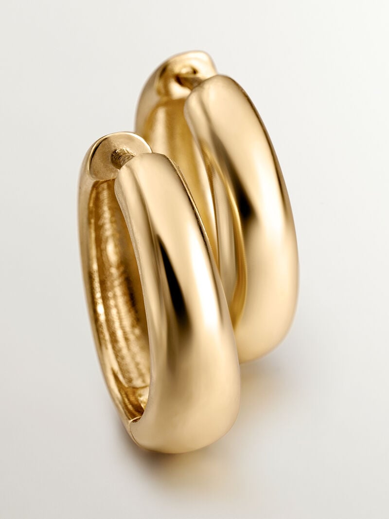 Medium thick hoop earrings made of 925 silver coated in 18K yellow gold. image number 4