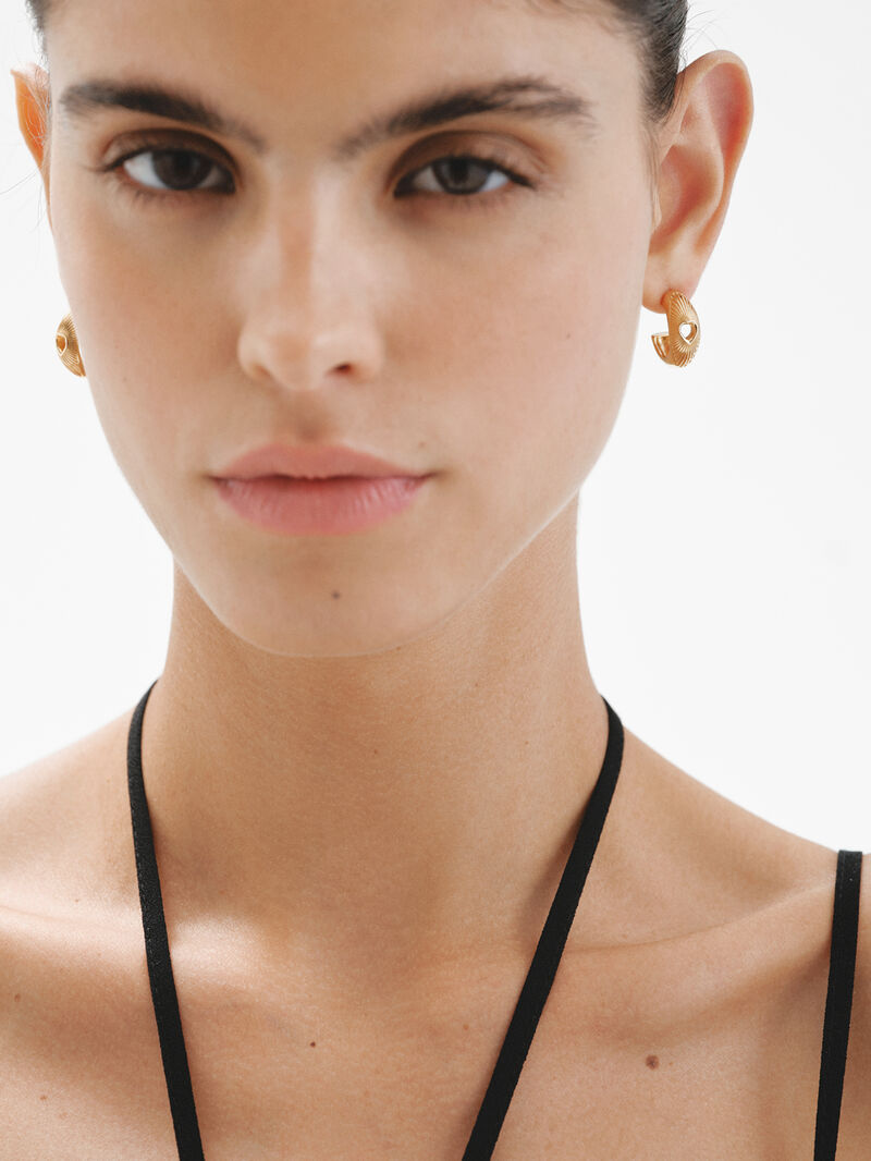 18K yellow gold plated 925 silver hoop earrings with heart and guilloché texture image number 3