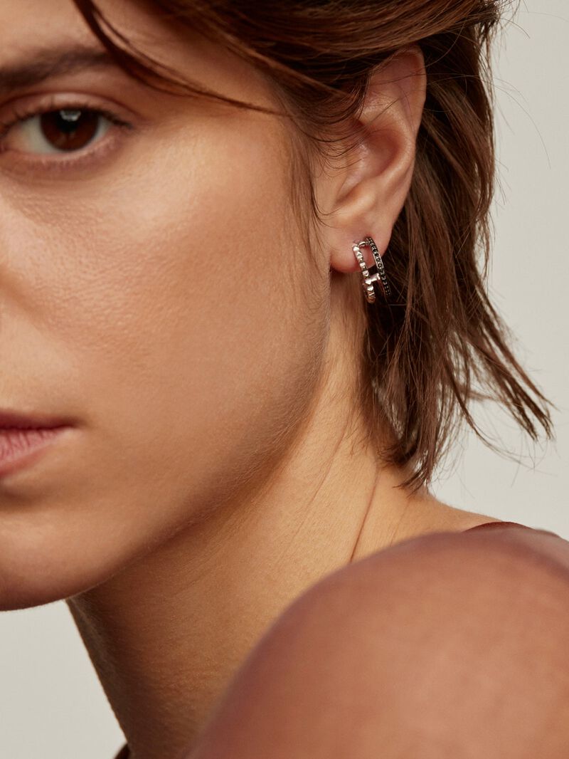 Double hoop earrings made of 925 silver with embossing and black spinels image number 1