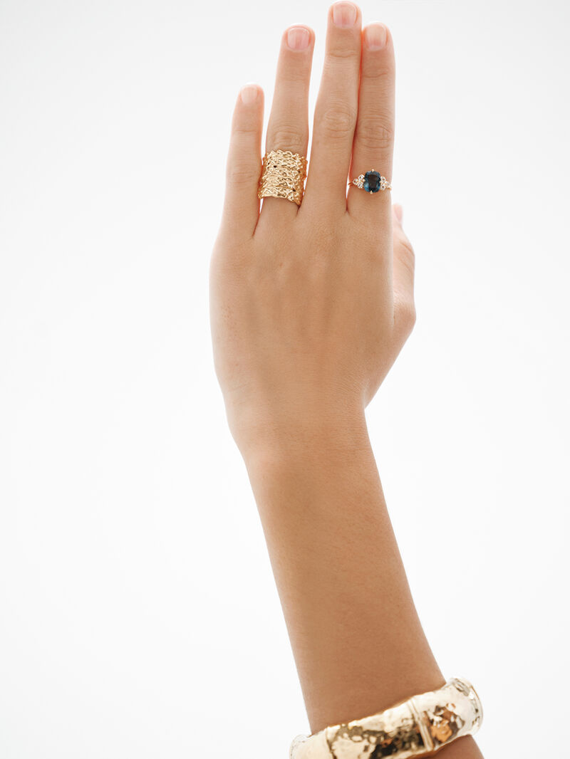 925 Silver ring bathed in 18K yellow gold with white topaz and London blue. image number 5