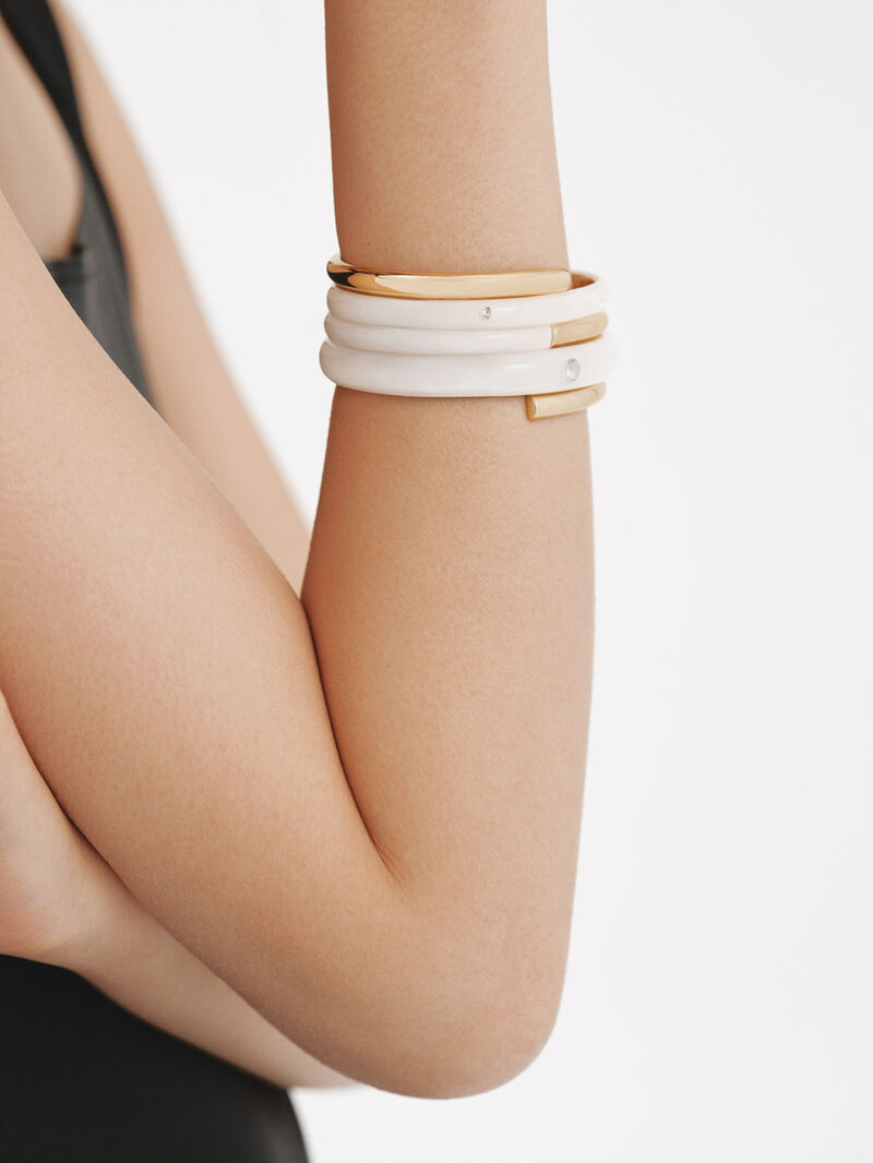 18K yellow gold plated 925 silver bracelet with white enamel and zircons suspended in resin image number 1