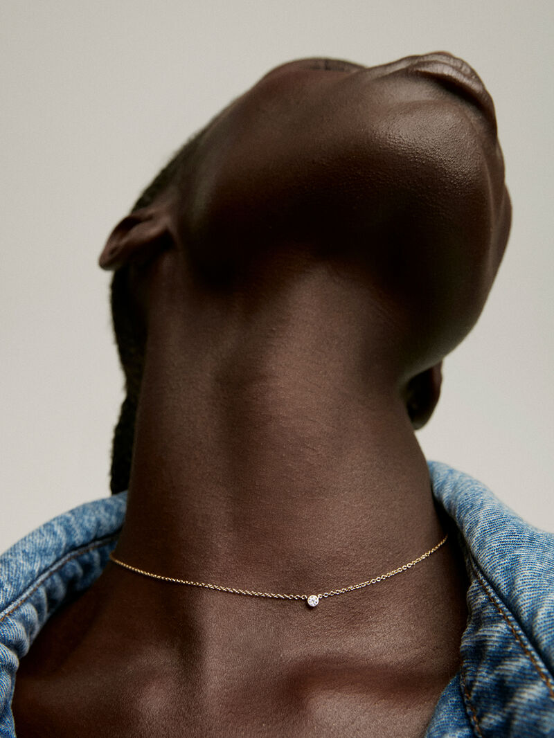 Single 925 silver pendant bathed in 18K yellow gold with white topaz image number 1