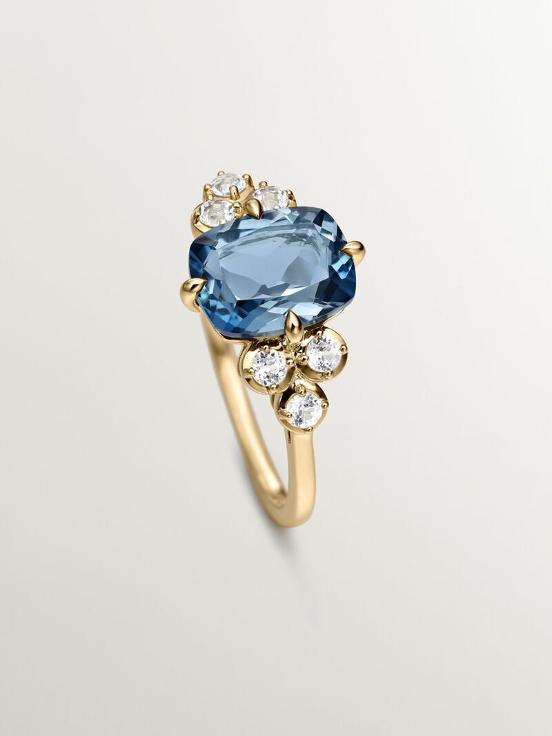 925 Silver ring bathed in 18K yellow gold with white topaz and London blue. image number 4