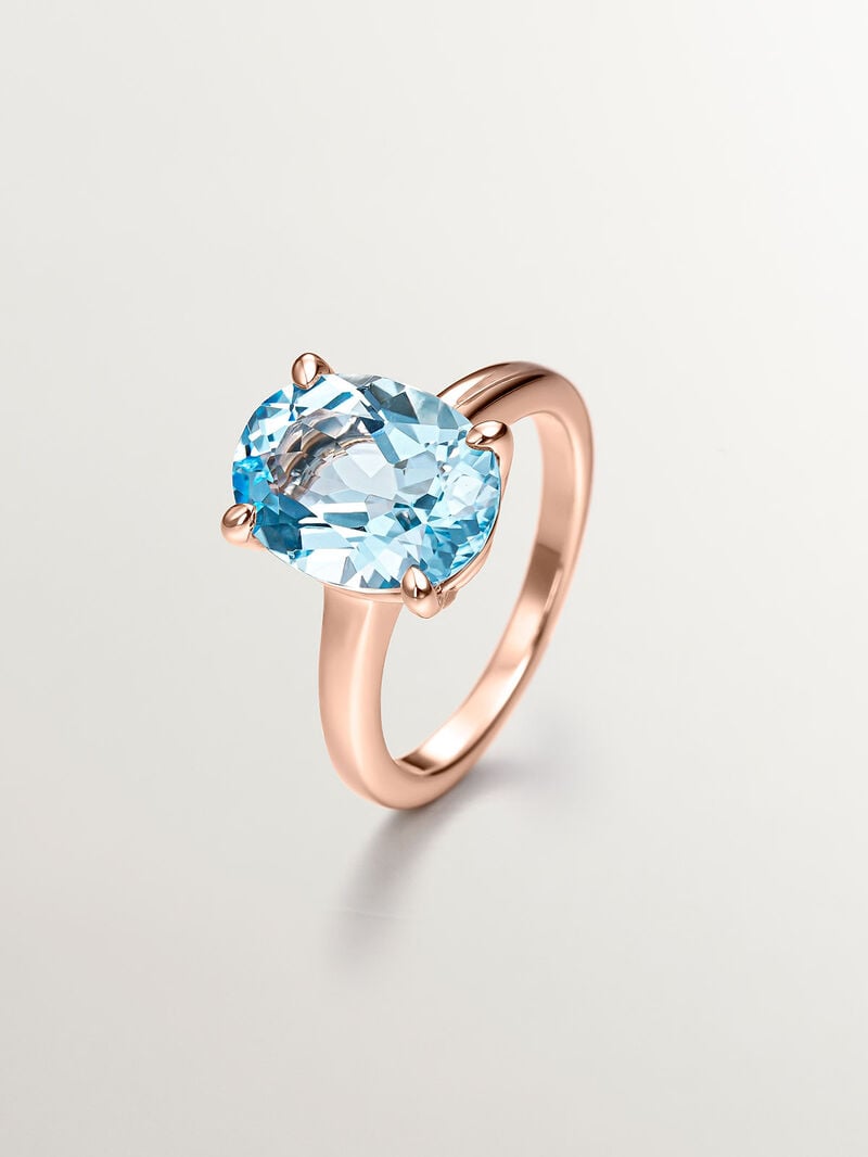 925 Silver ring coated in 18K rose gold with sky blue topaz image number 0