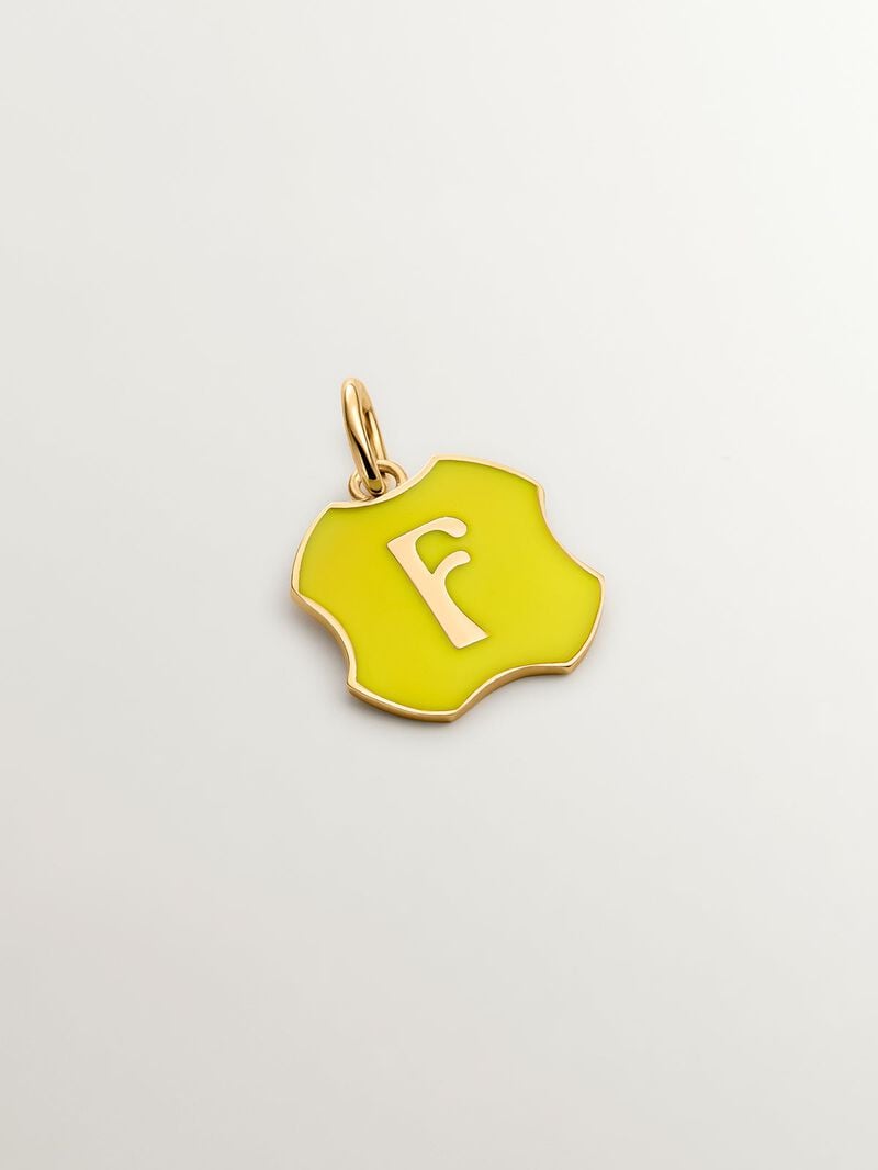 Charm in 925 sterling silver plated in 18K yellow gold with initial F and yellow enamel with irregular shape image number 0