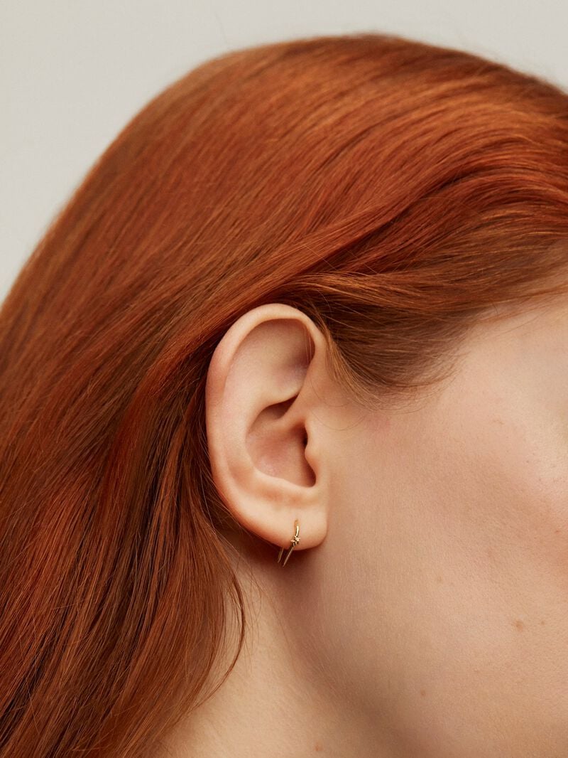 Individual open 9K yellow gold earring with star image number 3