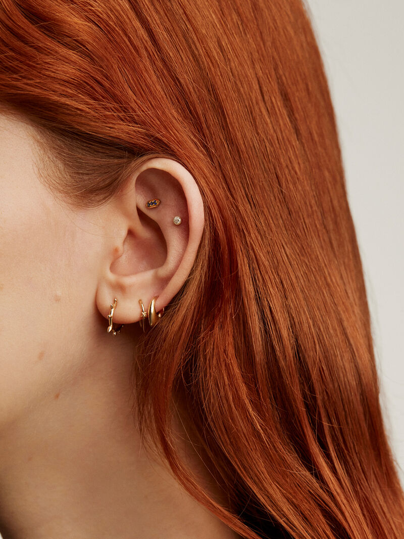 Individual open 9K yellow gold earring with star image number 5