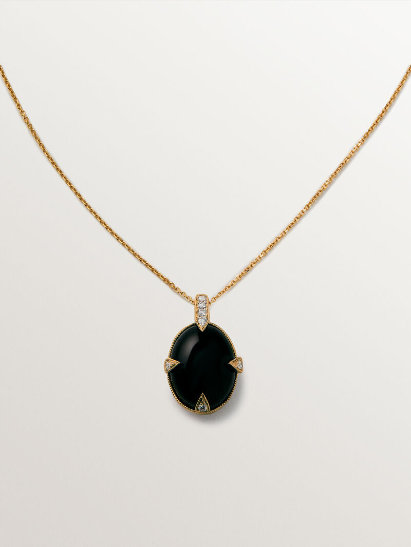 Colgante de oro amarillo de 18K con ónix negro y diamantes en talla brillante image number 0