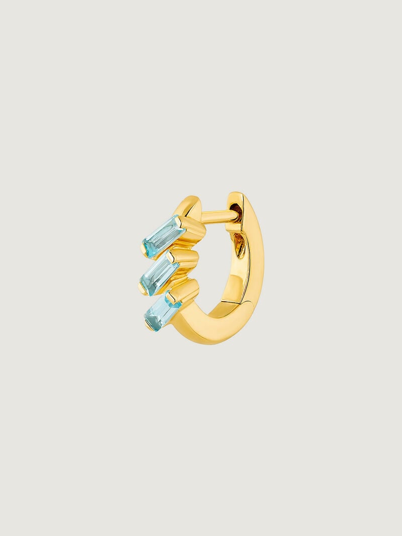 Individual hoop earring made of 925 silver, bathed in 18K yellow gold with sky blue topaz. image number 2