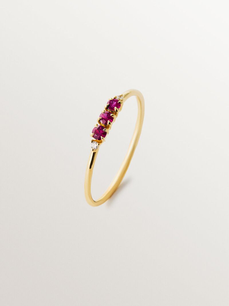 9K yellow gold ring with rubies and diamonds image number 0