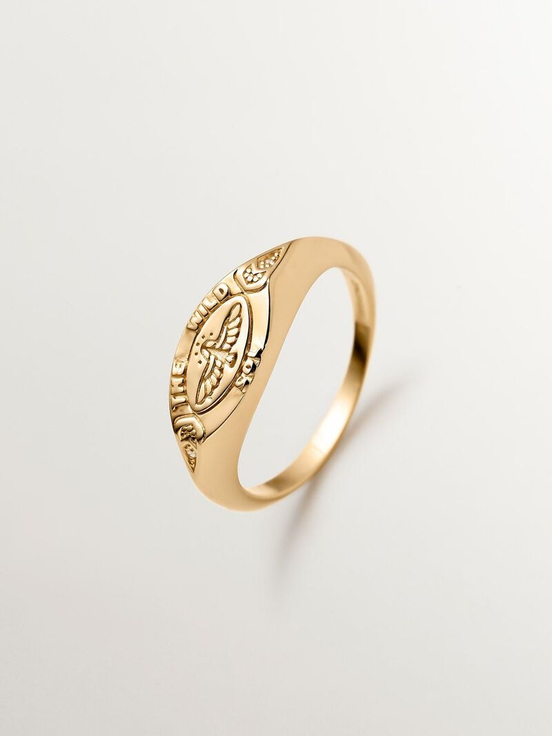928 Silver seal ring bathed in 18K yellow gold with white topaz and eagle. image number 0