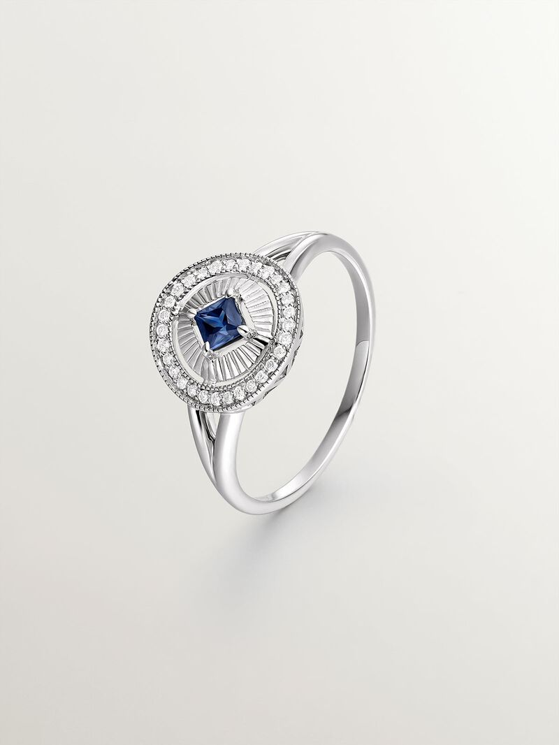 18K white gold ring with brilliant-cut diamonds and princess-cut blue sapphire image number 0