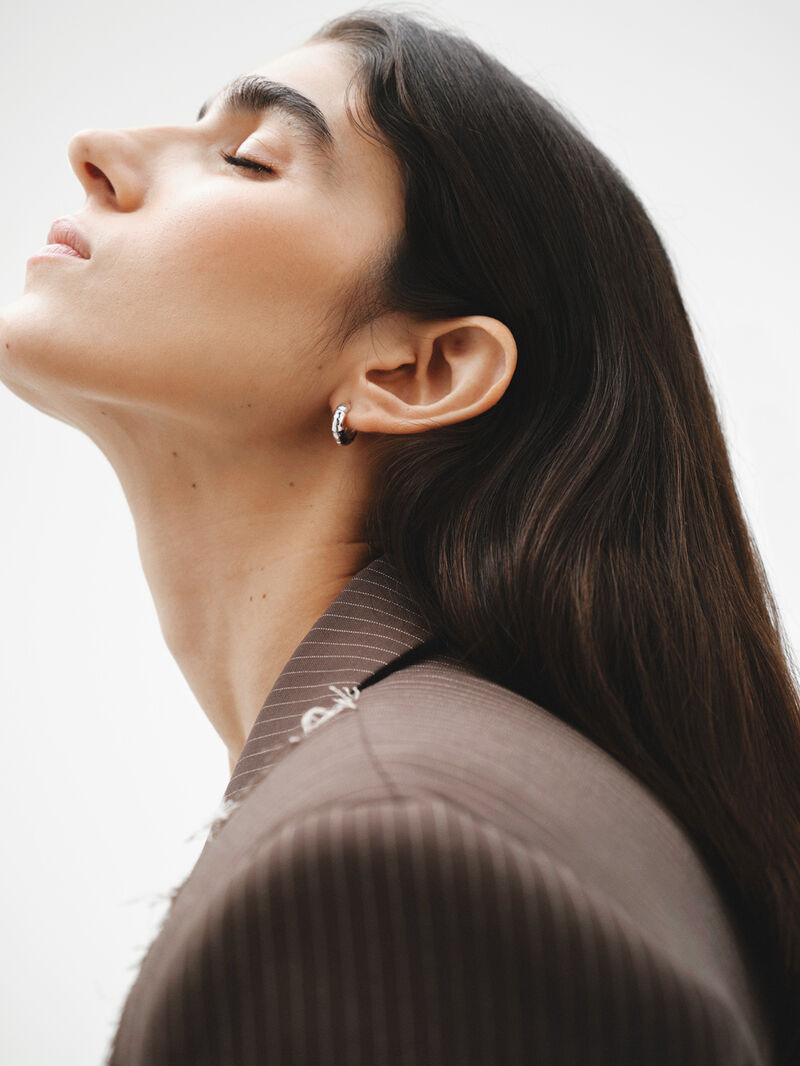 Small 925 silver hoop earrings with bamboo texture. image number 3