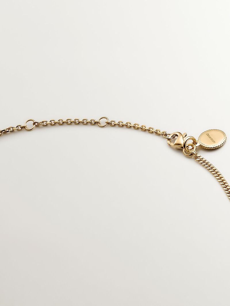 925 Silver pendant bathed in 18K yellow gold with pink rhodolite, London blue topaz, and green peridot. image number 6